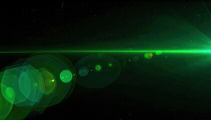 Green light beam flares across a dark background, with lens effect