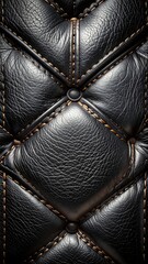 Fototapeta premium Close-up of black leather upholstery, diamond-stitched and buttoned