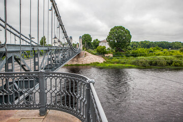 The Chain Bridge across the Velikaya River is the oldest operating chain bridge in Russia. Ostrov, Pskov Oblast, Russia