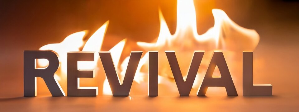word Revival in wooden letters on fire