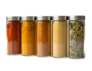 Aromatic Spice Assortment: A captivating array of vibrant spices, encased in transparent glass jars with metallic lids, inviting culinary exploration and the creation of flavor-rich dishes. 