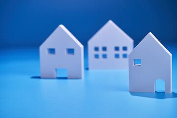 2d white house model against blue background