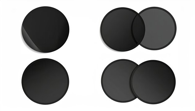 Four black circles in various arrangements on white