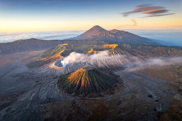 Bromo Mountain in East Java Indonesia Shows the Beauty of Volcanic Landscapes at Sunrise With Mist Rising From the Crater