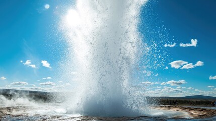 geyser. A powerful geyser erupting skyward, water droplets against blue sky, motion blur. ESG reports, sustainability campaigns, designed for environmental awareness campaigns.