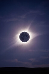 Obraz premium Beautiful solar eclipse with moon covering the sun, dramatic sky astronomy