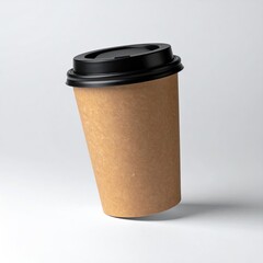 A tilted, brown paper coffee cup with a black lid against a white backdrop