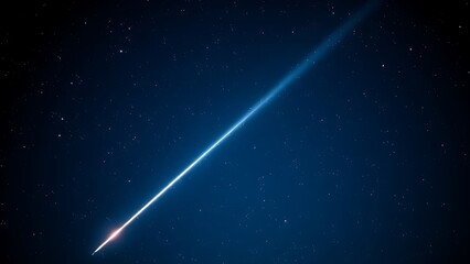 A brilliant meteor streak with a glowing tail in a star-filled night sky.