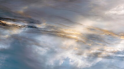 Soft abstract pattern resembling marble with blue and golden tones