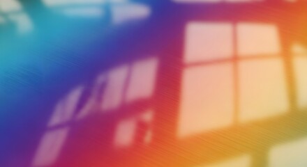 Vibrant abstract background featuring a dynamic window shadow overlayed on a gradient of rich blues purples pinks and warm orange tones