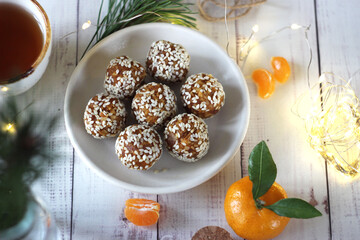 Sweet sesame balls in a saucer on the table