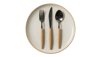 A plate with a knife, fork, and spoon on a black background