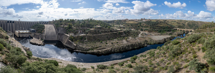 Panoramic view of a dam and river landscape