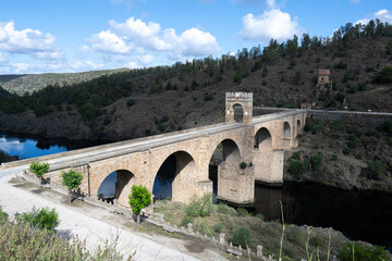 Fototapeta premium Historic Alcántara Roman Bridge over a river