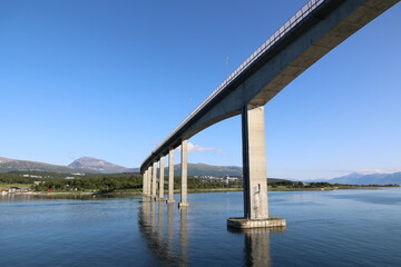 The Sandnessund Bridge is a bridge between the islands of Troms&oslash;ya and Kval&oslash;ya in the municipality of Troms&oslash; in the county of Troms, Norway