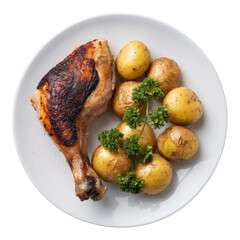 roasted chicken leg with potatoes on white plate.