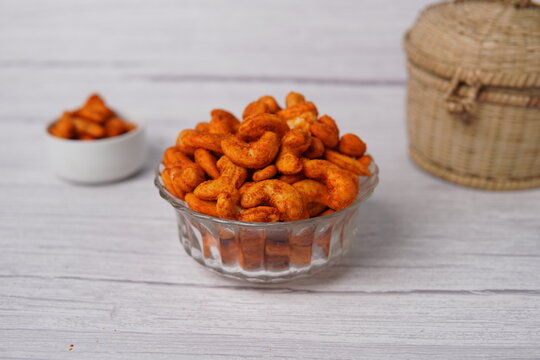 Flavorful peri peri kaju featuring premium cashew nuts coated with bold peri peri spices for a spicy, tangy kick. This crunchy snack combines rich cashew texture with vibrant seasoning, making it popu