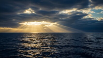 Dramatic sun rays piercing through dark, heavy clouds over a vast ocean surface at sunset, creating a breathtaking and ethereal seascape scene with a profound sense of wonder and calm