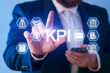 Business professional interacting with KPI data on digital display in office setting