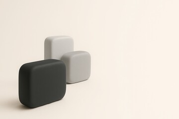 Three matte 3D blocks arranged in a stepped hierarchy on clean background, largest dark block in front, two smaller light gray blocks behind and higher, minimal composition for tier structure
