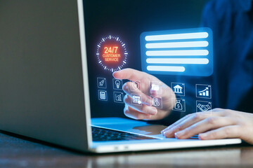 Customer service interaction on a laptop with digital interface at home office during evening hours