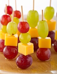 Fresh Grapes and Cheese Cubes on Wooden Skewers