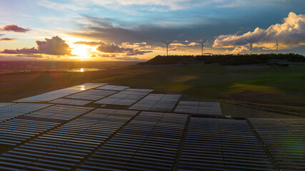 Solar Panels and Wind Turbines at Sunset, Renewable Energy Landscape
