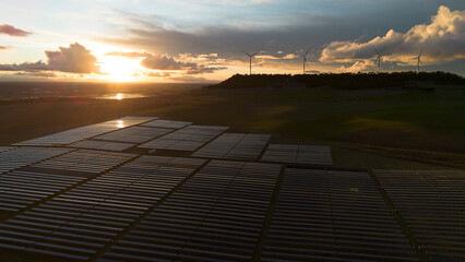 Renewable Energy Landscape with Solar Panels and Wind Turbines