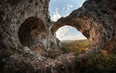 Natural Heart Shaped Rock Formation in Mountain Landscape