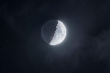 Crescent Moon and Stars over Dark Sky