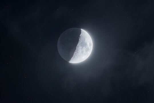 Crescent Moon and Stars over Dark Sky