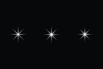 Fototapeta premium Sparkling starburst fireworks glowing on an abstract starry night background