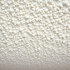 Slightly bumpy popcorn ceiling reveals a classic, textured finish ideal for home renovation,  texture,  bumpy