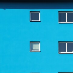 Fototapeta premium Residential building featuring a vibrant blue exterior paint scheme under bright daylight, highlighting classic suburban architecture and design, deep, construction, colorful