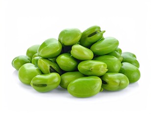 Pile of fresh, glossy, green broad beans on a clean white backdrop