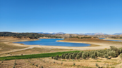 Due to global warming and a rainless winter, the water level of the dam lake in the Mediterranean region has significantly receded