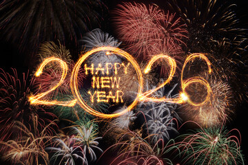 Happy new year 2026 text written with Sparkle fireworks isolated on black background