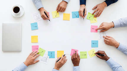 Teamwork brainstorming concept with hands working on project sketches notes sticky pads coffee on white desk creative office cooperation partnership planning business background copy space startup
