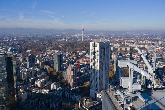 Aerial view from viewing platform of Main Tower platform with skyline and blue sky background and UBS bank tower on a sunny autumn day. Photo taken November 22nd, 2025, Frankfurt am Main, Germany.