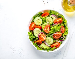 Fresh vegetable salad with lettuce, tomatoes, cucumbers, and onions