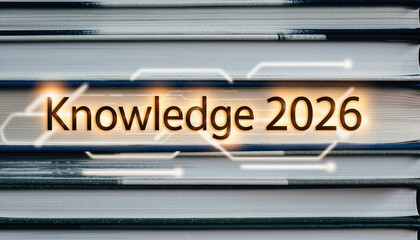 Stack of books with glowing Knowledge 2026 text overlay
