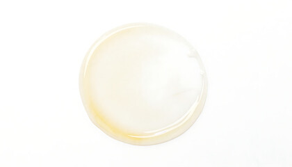 A soft, pale yellow glass sphere sits against a white background, glowing with gentle light, HD and 4k image