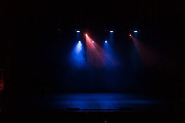 scene, stage light with colored spotlights and smoke