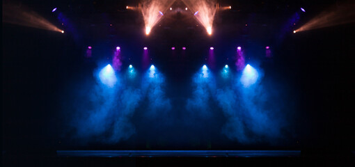 scene, stage light with colored spotlights and smoke