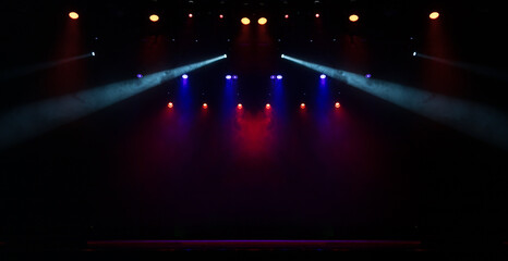 scene, stage light with colored spotlights and smoke