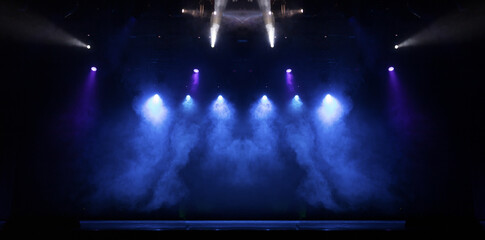 scene, stage light with colored spotlights and smoke
