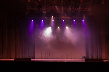scene, stage light with colored spotlights and smoke