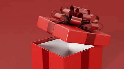 An open red gift box with a bow on a red background is photographed from above