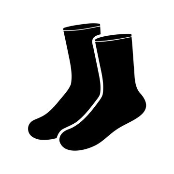 Two cozy black socks standing side by side on a white background