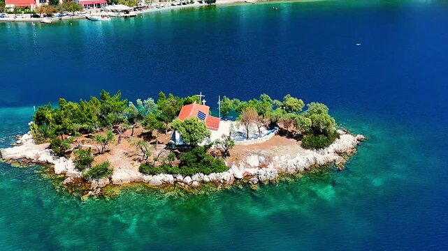 Agios Nikolaos islet on the Delphi Riviera, Greece